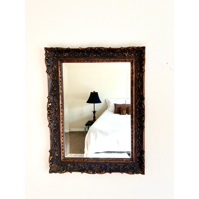 Ornate Beveled Wall Mirror with Carved Wood Frame – 22” x 28” Add timeless elegance to any room with this beautifully...