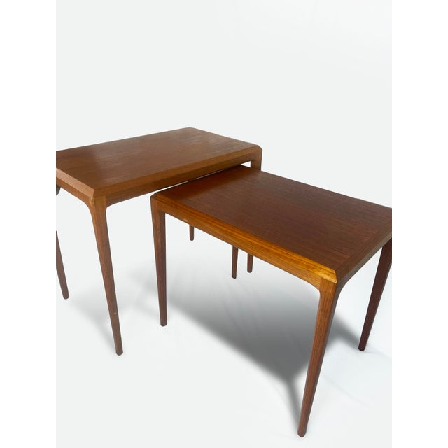 Two teak side tables designed by johannes andersen and manufactured by sikeborg in denmark in the 1960s. It is a known...