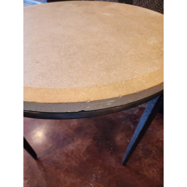 Vintage design center cast metal and cast stone round end table.