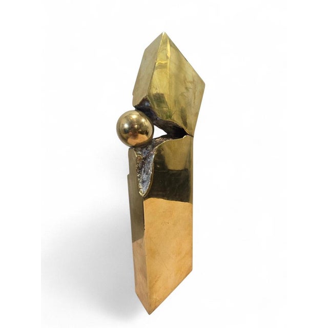 Elegant abstract sculpture in solid bronze, created during the 1970s and signed and numbered by the artist. This refined...