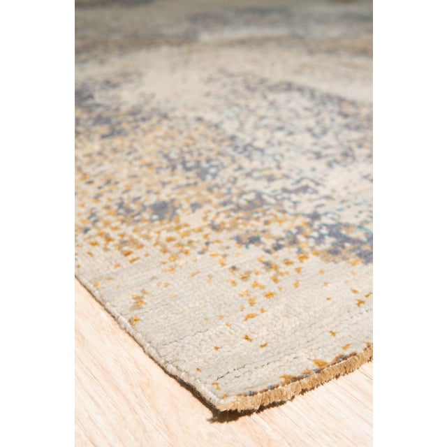 Lydia Cassandra Gray Hand Knotted Wool Rug, Country of Origin: India. This exceptional piece blends traditional hand-...