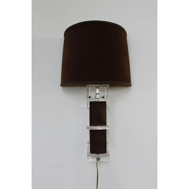 This beautiful wall sconce was made by the Bauer company for the Clearlite line, the body is made of lucite pieces with...