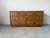Handsome 1970s Mid-Century Modern dresser by Drexel, crafted in solid pecan with beautiful natural grain patterns...