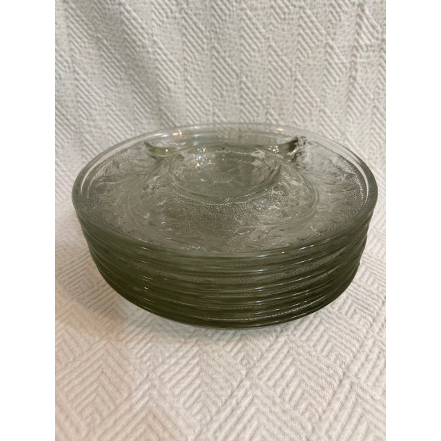 Clear glass artichoke plates… a different spin on the usual white earthenware ones! These are a rare find and this set of...