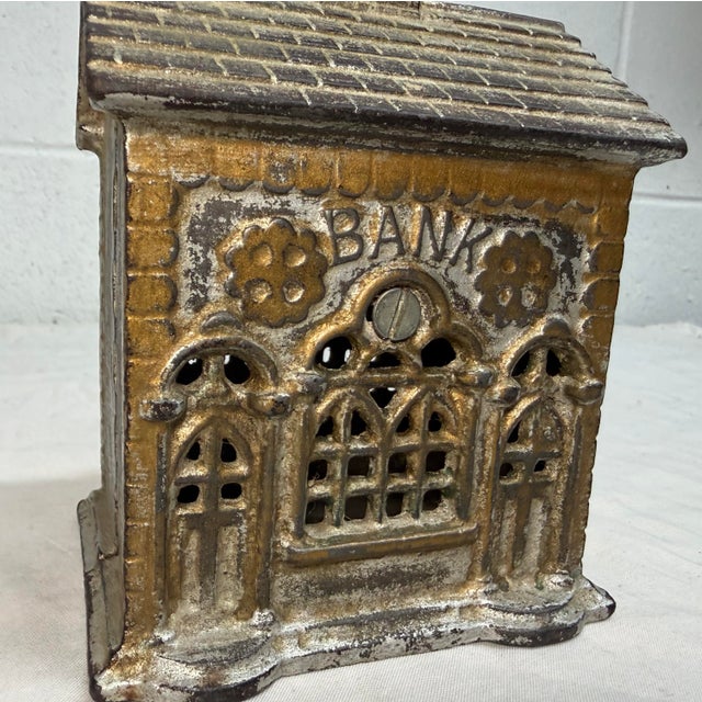 This Antique A.C. Williams Cast Iron Double Door Savings Bank Building Still Bank is a unique and collectible piece made...