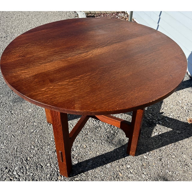 A wonderful fine quality Gustav Stickley round table that is perfect for center hall, foyer or as a small dining table....