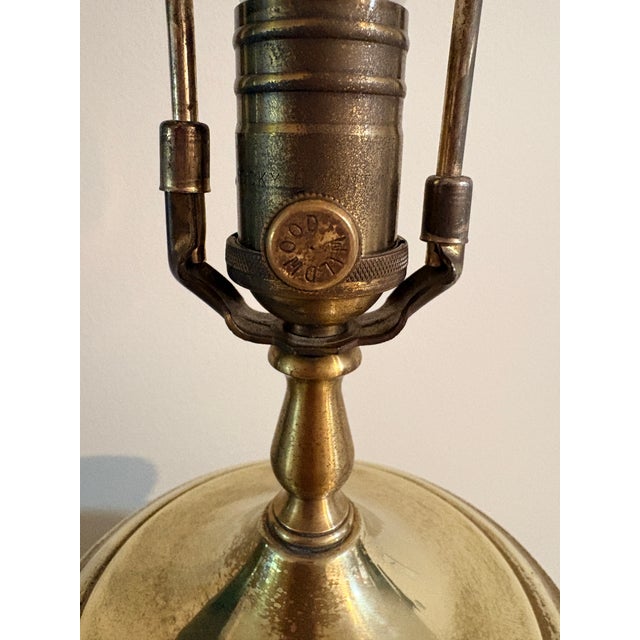 A striking vintage table lamp by Wildwood, featuring an elaborately decorated ceramic body with an Asian-inspired...