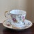 Offering a lovely vintage Elizabethan Fine Bone China teacup and saucer set made in England. This elegant set features...