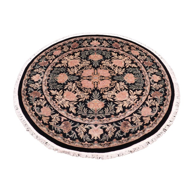 This hand‑knotted Pak Persian round rug showcases the finest expression of traditional Persian artistry. Each piece is...