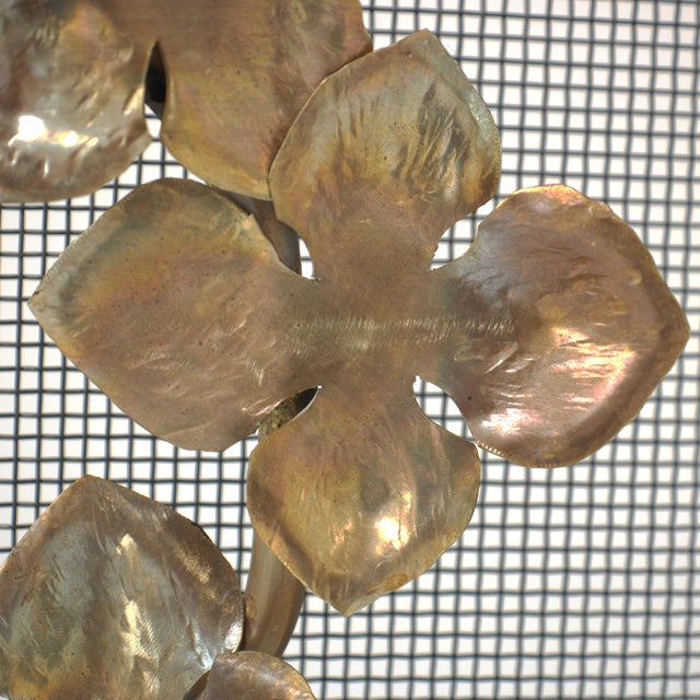 Inspired by the ephemeral, delicate beauty of cherry blossoms opening in the spring, the Sakura fireplace screen is made...