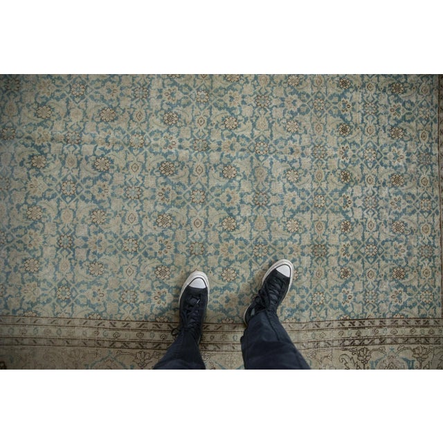 :: Covered field in a repeating Herati motif wrapped by multiple inner and outer minor borders, and main border in a large...