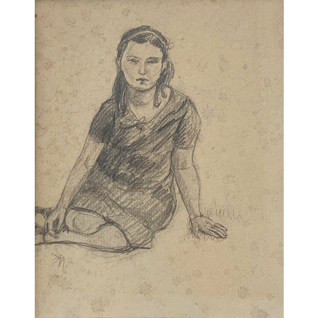 We love the open negative space created by the off-center framing of the sitter. She appears to be a serious young woman...