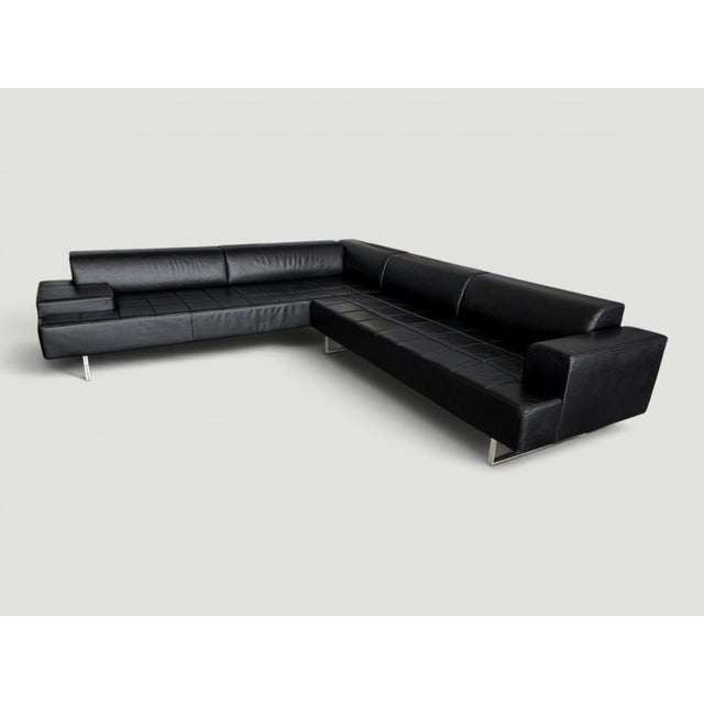 Designed by studio cerri & associati and produced by poltrona frau in 2005, the quadra sectional sofa is an iconic...