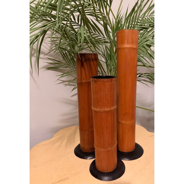 A fantastic set of 3 Pilar golden bamboo & metal candle holders. Perfect for your tropical or coastal style. The set...