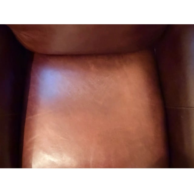 American style roll-arm classic club chair in rich chestnut/cognac brown genuine leather. Comfortable, well made chair...