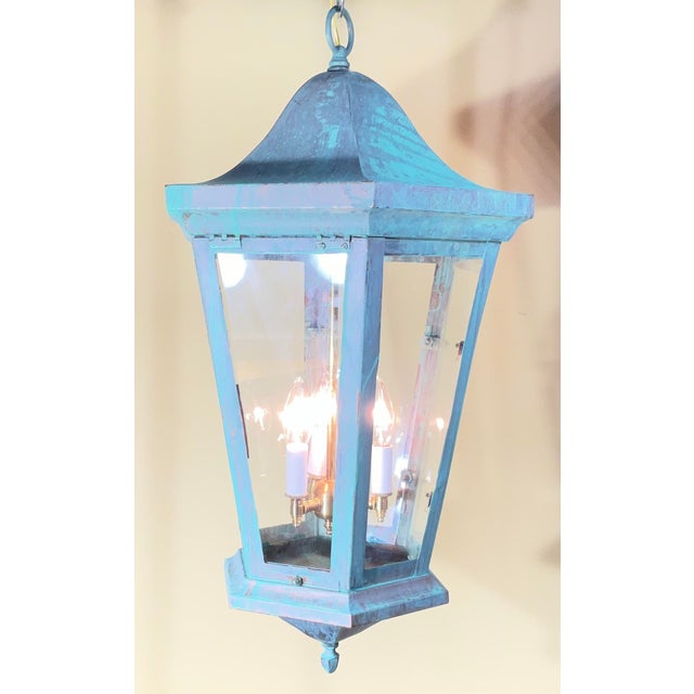 exquisite vintage solid brass hanging lantern. This piece features a classic hexagonal tapered silhouette and has been...