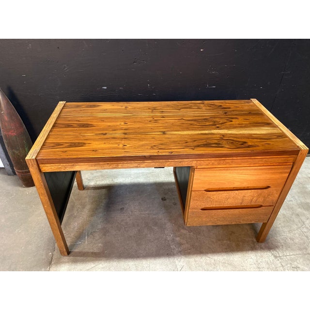 Gorgeous mid century modern Rosewood & figured Palmwood desk made in Columbia in the 1960's. attributed to Arte Sano. The...