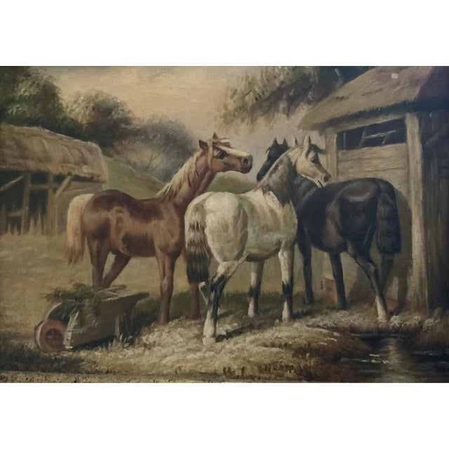 This lovely 19th century oil painting on wood depicting three horses outside their barn, includes a custom gilt frame made...