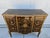 A gorgeous Venetian style two drawer chest or commode by John Widdicomb. The golden stencil work stands out against the...