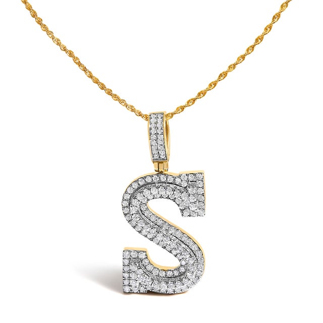 Claim your initial with unapologetic presence. This bold block “S” rises in 10K solid yellow gold, its strong squared tips...