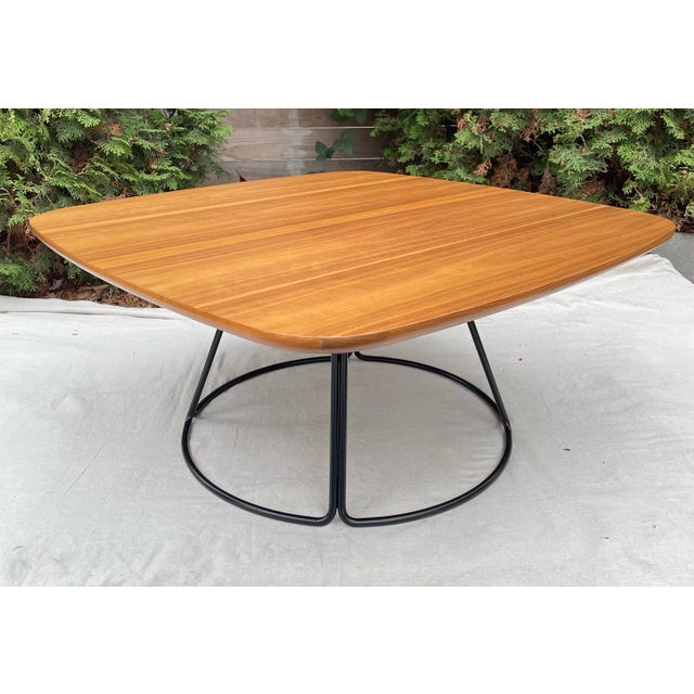 Keilhauer Geometry 71237 Mid-Century inspired walnut coffee table with a square top and a black metal base. This is a high...