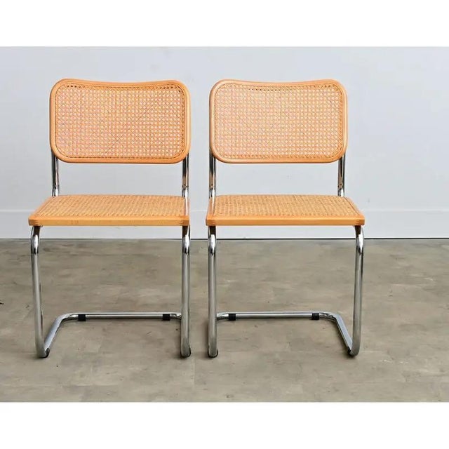 A fantastic pair of vintage Italian “Cesca” style armless chairs in the manner of Marcel Breuer. First presented in 1928,...