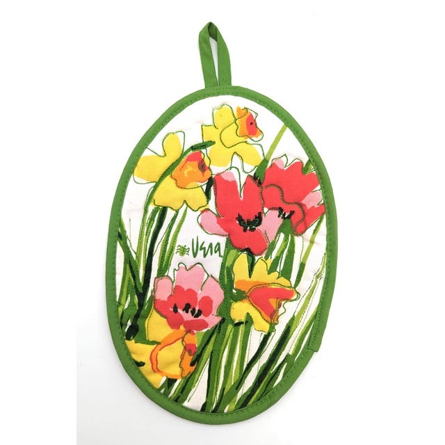 Offered are three vintage 1970s Vera Neumann quilted cotton multi-colored "Iris" pot holders. The bold print features...