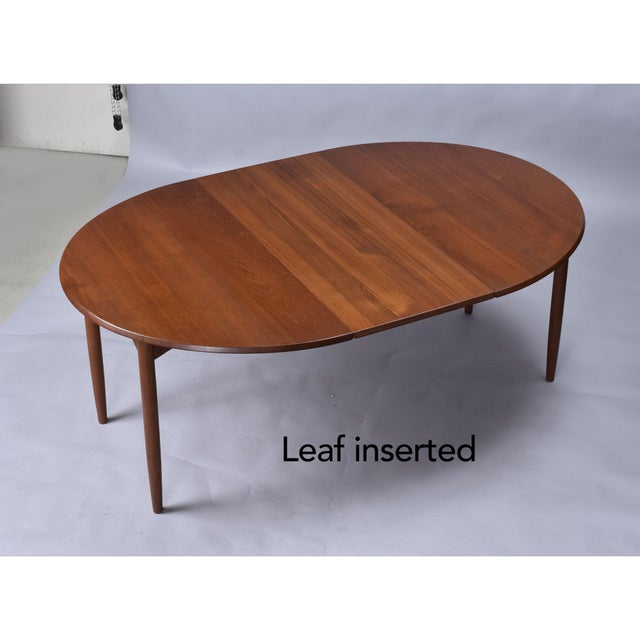 Expanding Round to Oval Early Danish Teak Dining Table With 2 Leaves For Sale - Image 4 of 14