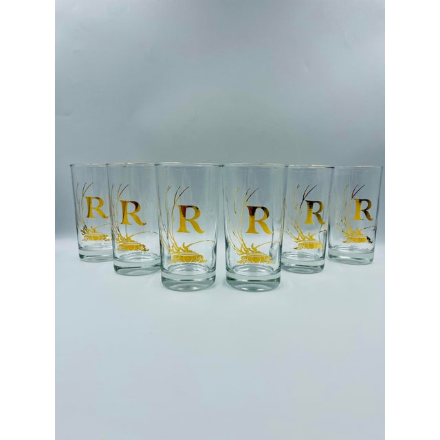 Bring a touch of Hollywood Regency charm to your barware collection with this striking set of six vintage highball...