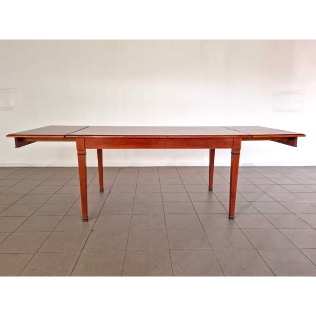 Dimensions: W 58.6" / D 35" / H 30.2" Extended: 92.6" Elegant Mid-century Modern style Danish dining or conference table....