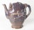 We are selling this interesting Chinese puzzle jug teapot. This teapot has very attractive purple aubergine junyao type...