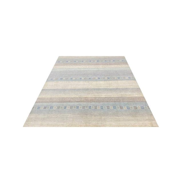 Exact Size: 7'10" x 9'8" Color: Gray Age: New Materials: Wool Construction: Hand Knotted Origin: Pakistan