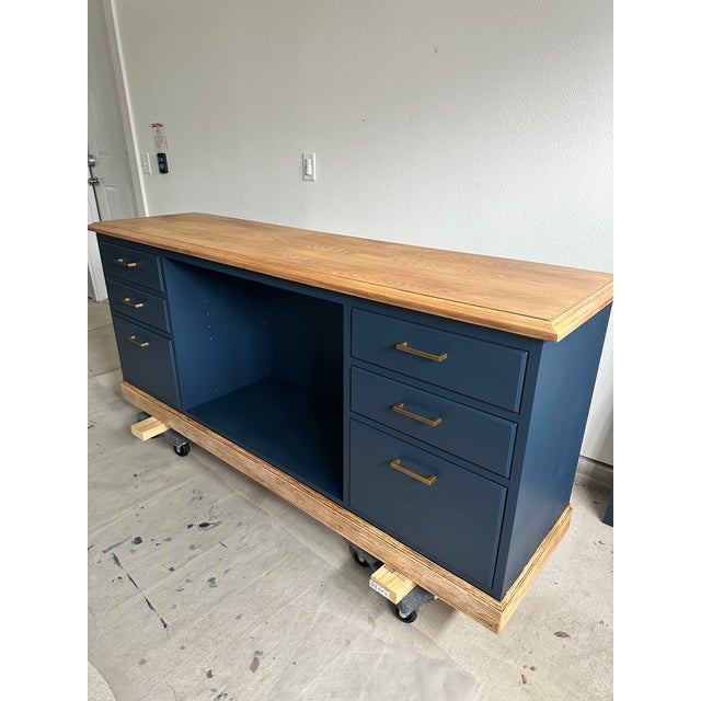 Professionally refinished solid cherry wood storage credenza / console in a beautiful dark navy finish, featuring a...