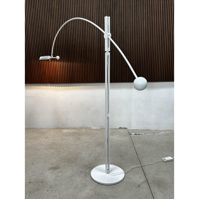 Model 8023 "Counter Balance" arc lamp in white lacquered steel by Robert Haussmann for Swiss Lamps International from the...