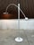 Model 8023 "Counter Balance" arc lamp in white lacquered steel by Robert Haussmann for Swiss Lamps International from the...