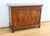 This burr mahogany veneered sideboard opens at the waist with a large, slightly concave drawer fitted with an authentic...