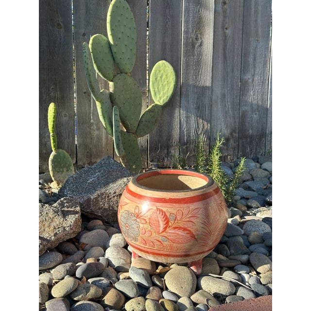 Charming vintage Tonalá (Jalisco, Mexico) footed pot featuring classic hand-painted floral and foliate motifs in soft red,...
