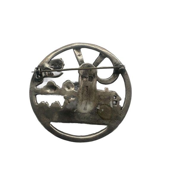 This is part of Chairish’s Costume Jewelry assortment. This vintage brooch pin, crafted from 925 sterling silver,...