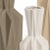 set of 3 geometric shaped vases with white, charcoal and tan glaze. small 12"h x 4.5"w x 4.5"d medium 16"h x 6"w x 6"d...