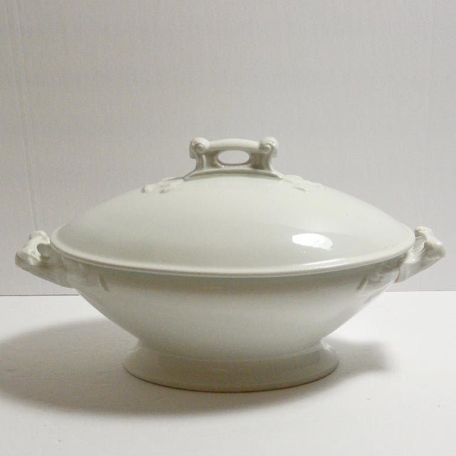 This gorgeous, antique white ironstone covered vegetable dish was created by Maddock & Company of Burslem, England in...