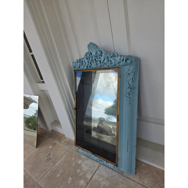 Beautiful old mirror backed interior display case with gilt metal mounted glass door. This has brackets for glass shelves...