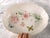 This is a large oval serving bowl by Lenox in the Butterfly Meadow pattern from 1999. The inside of the bowl has large...