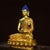 This is a finely crafted antique gilt bronze sculpture of Shakyamuni Buddha, the founder of Buddhism. The Buddha is...