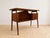 Gunnar Nielsen designed a family of teak desks, secretaires, and case pieces for Tibergaard in the 1960s. This compact...