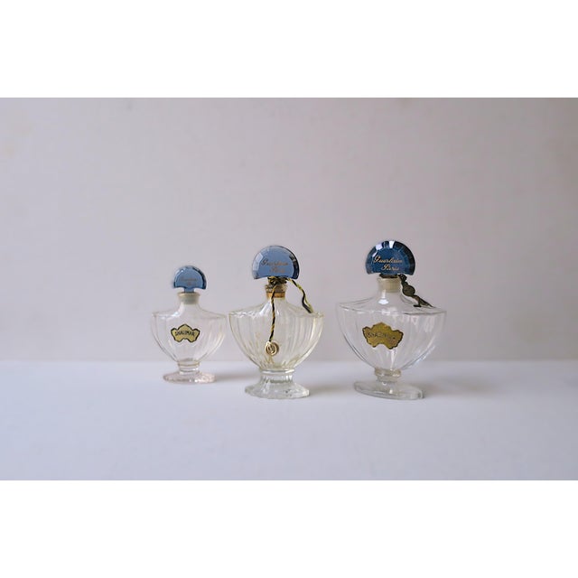 Three (3) iconic French perfume bottles, perfume Shalimar, by Guerlain Pairs, known as the Flacon Chauve Souris (The Bat),...