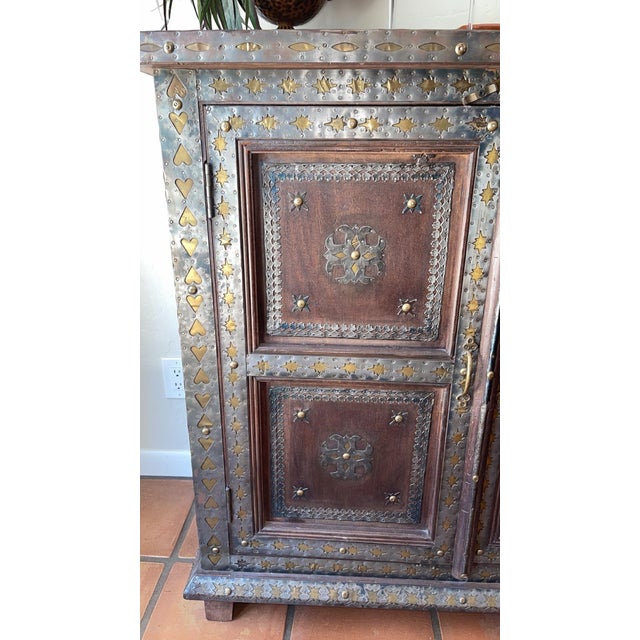 Extremely elegant hand made Hardwood Sideboard / buffet. Long Cedar wood sideboard dressed with hammered brass sheets and...