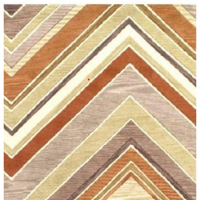 This contemporary rug is from the Modern collection and features a border tan pattern. These rugs bring modern...