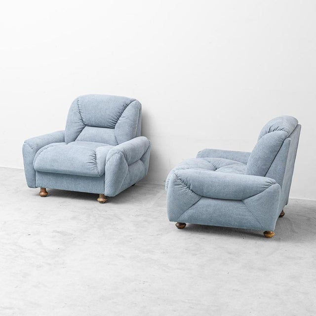 Pair of armchairs made in the 1950s. The light blue fabric upholstery has been replaced. Excellent condition, as shown in...