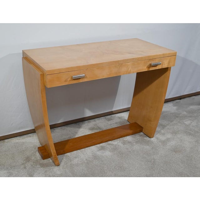 This sycamore console, which can also be used in a small desk, has a tray made up of a four developed sheets. This all...