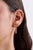 These half hoop earrings showcase 4.07 carats of natural oval cut rainbow sapphires, set in 14K yellow gold. Each...